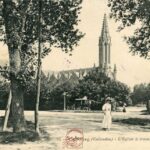 Cabourg - L'église à travers les arbres