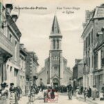 Neuville de Poitou - Rue Victor Hugo et église